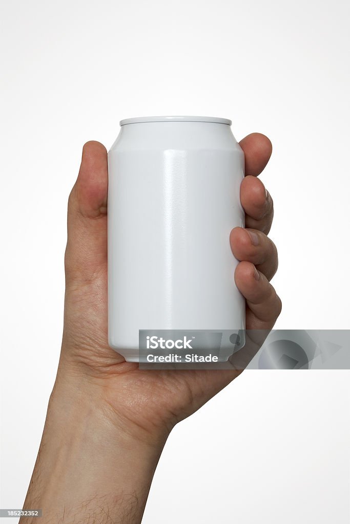 Hand Holding A Drink Can With Clipping Path Hand with clipping path holding a can. Human Hand Stock Photo
