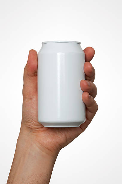 Hand Holding A Drink Can With Clipping Path Hand with clipping path holding a can. tin stock pictures, royalty-free photos & images