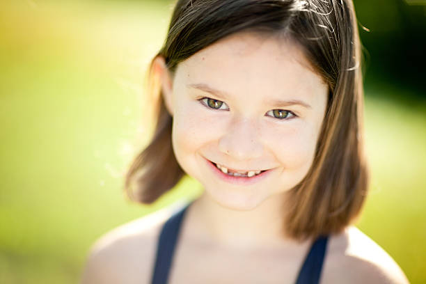 istock Close Up Of Little Girl Smiling, With Missing Teeth 185232711