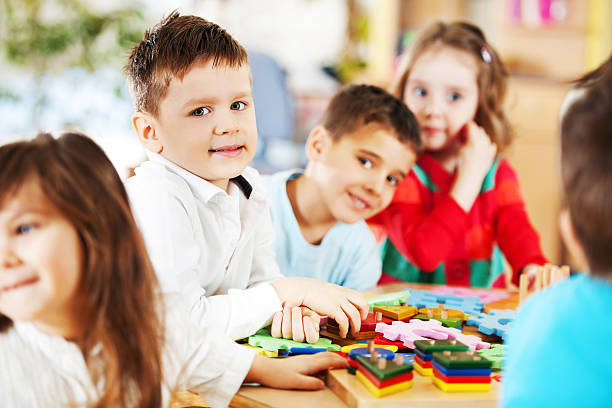 istock Large group of kids playing together 185232756