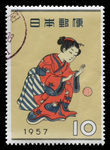 Japan Postage Stamp: traditionally dressed girl.