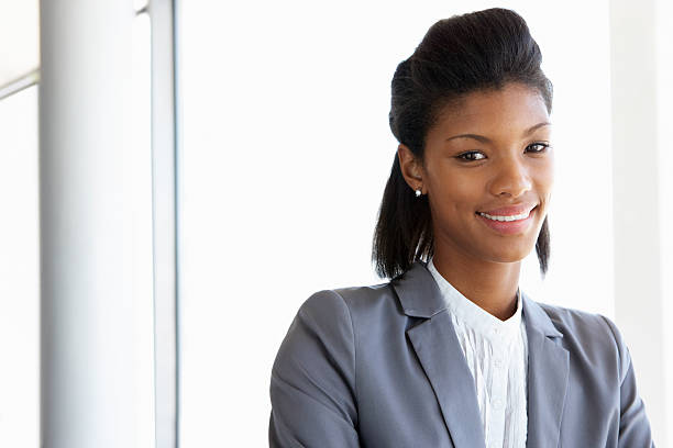 istock Young Businesswoman Standing In Modern Office Building 185233228