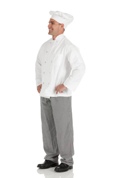 istock Happy male chef standing with arms akimbo 185233340