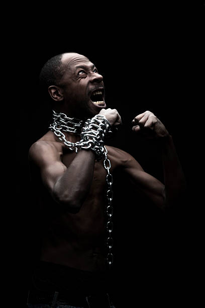 istock Portrait of a Black Man in Chains 185233910