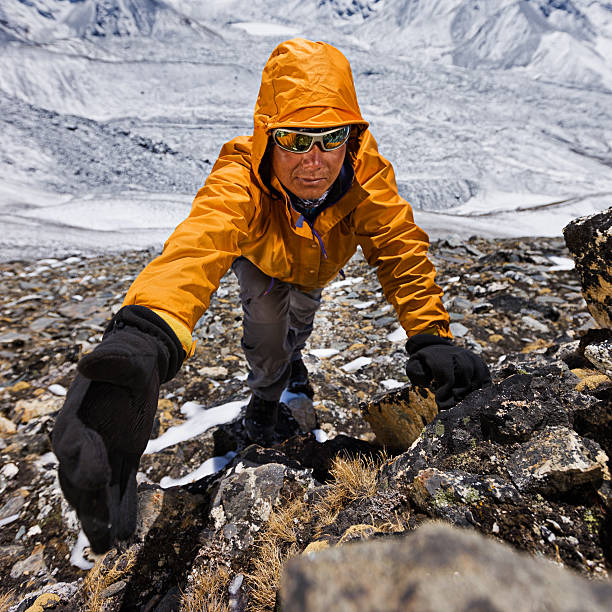 istock Nepali sherpa climbing in Himalayas 185234651