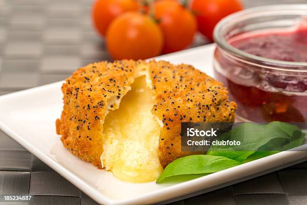 Baked Camembert With Cranberry Sauce Stock Photo - Download Image Now - Baked, Breaded, Brightly Lit