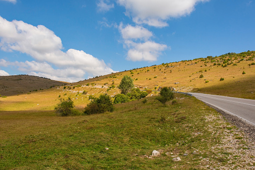 The Bravsko Polje karst landscape near Bosanski Petrovac in Una-Sana Canton, the Federation of Bosnia and Herzegovina. Early September