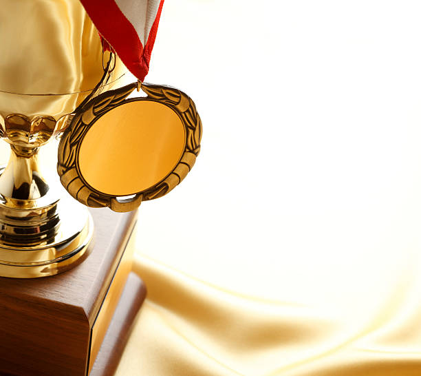 istock Gold medal hanging from a trophy 185234998