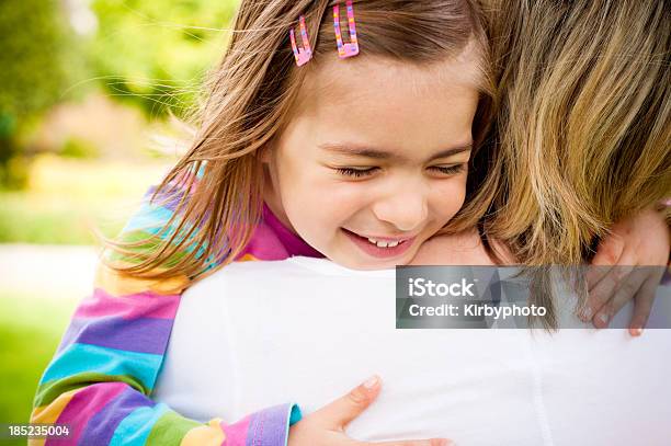 Hugging The Mother Stock Photo - Download Image Now - Candid, Child, Close-up
