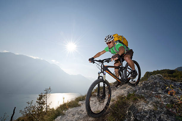 istock Sporting man riding on single track trail 185235091