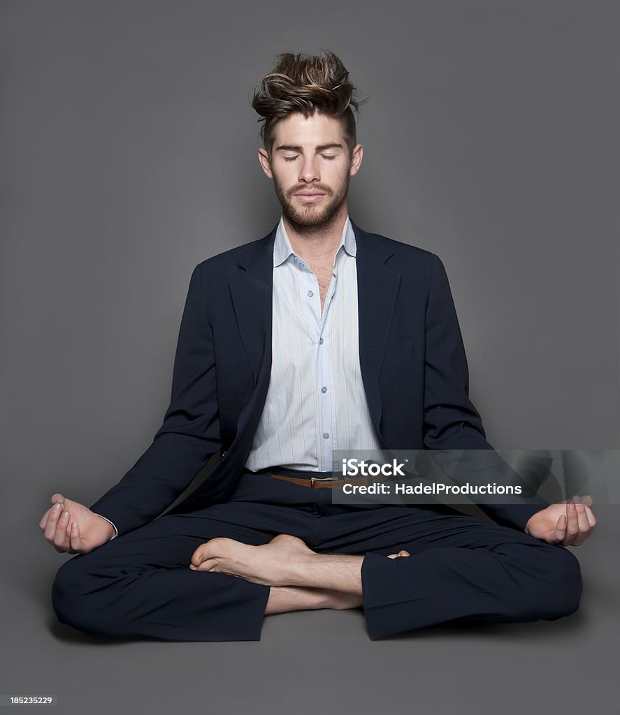 Businessman meditating Studio Shot Stock Photo