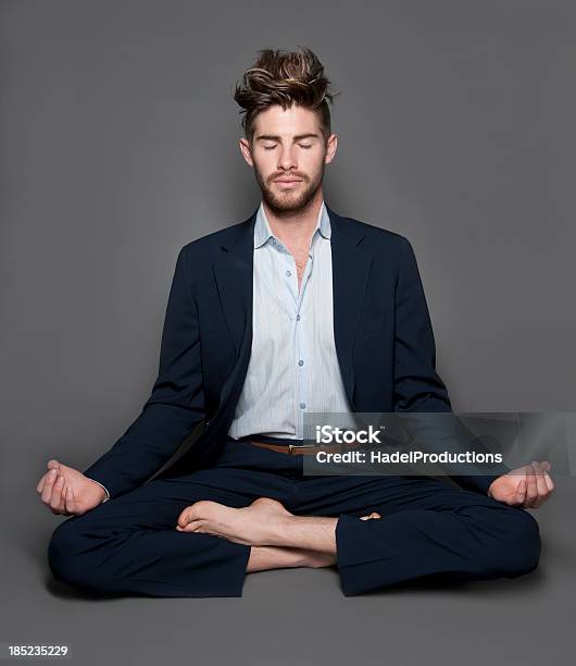 Businessman Meditating Stock Photo - Download Image Now - Studio Shot, Portrait, Wellbeing