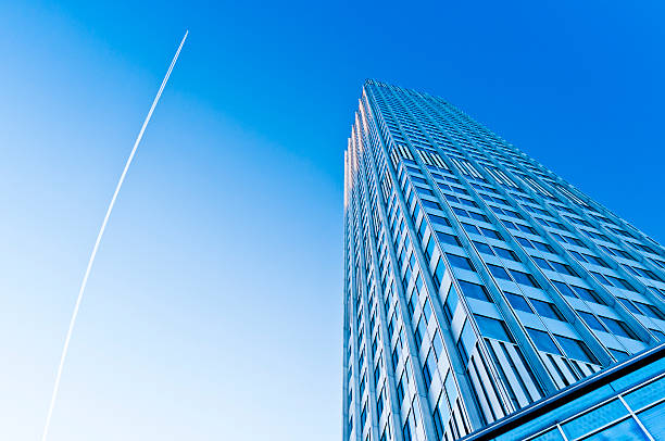 Eurotower with blue sky and jet trail