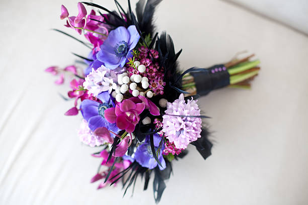 Purple and fuschia wedding bouquet stock photo