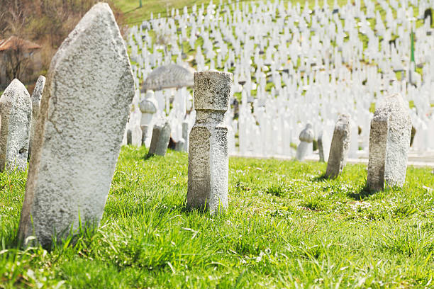 istock morning light on old and new grave yard in Sarajevo 185235955