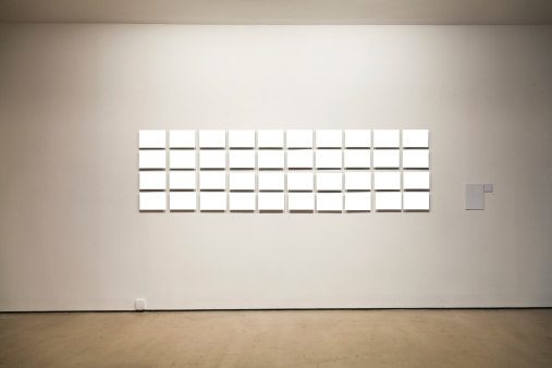 Group of blank frames on the wall at art gallery