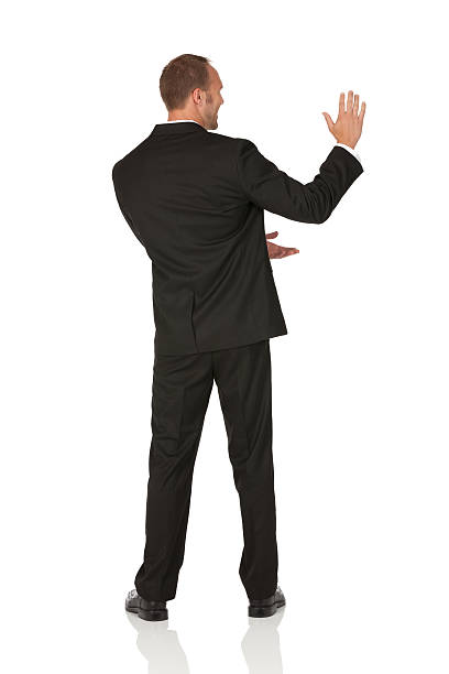 Rear view of a businessman gesturing