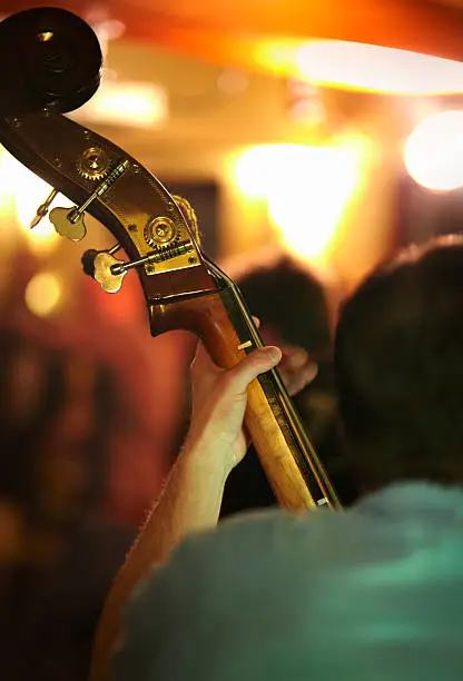 "Part of a kontra bass player, available light , high iso shot, shallow depth of field!"