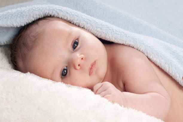istock Newborn Baby with Blue Blanket 185237174