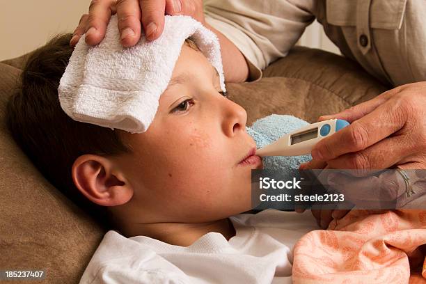 Sick Child Stock Photo - Download Image Now - Adult, Boys, Child
