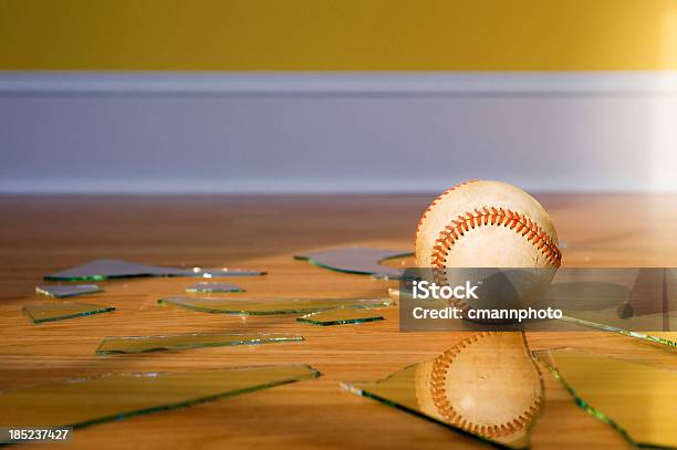 Baseball With Broken Window Glass On Wood Floor Stock Photo - Download Image Now - Breaking, Window, Broken
