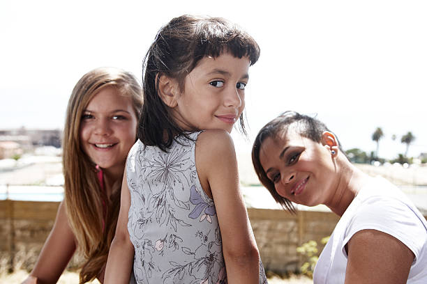 istock Three females at the beach together 185237767