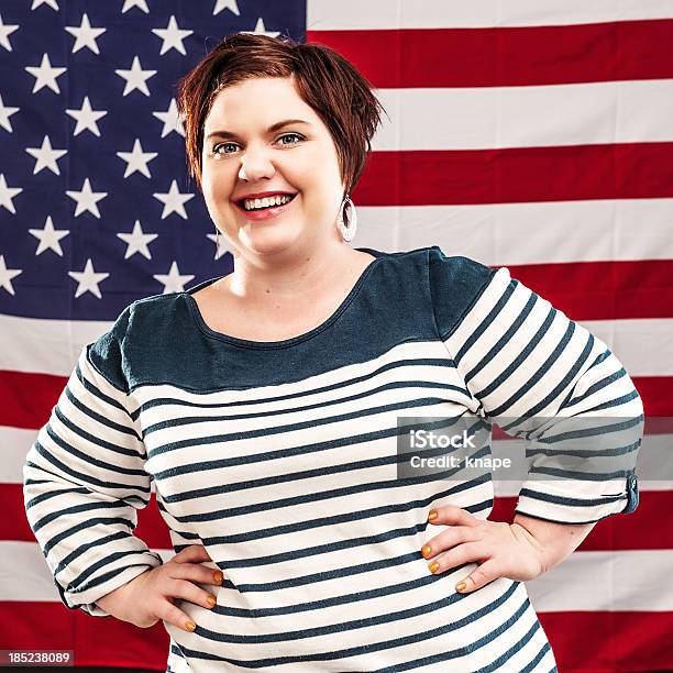 Happy Woman Infront Of An American Flag Stock Photo - Download Image Now - 30-34 Years, 30-39 Years, 35-39 Years