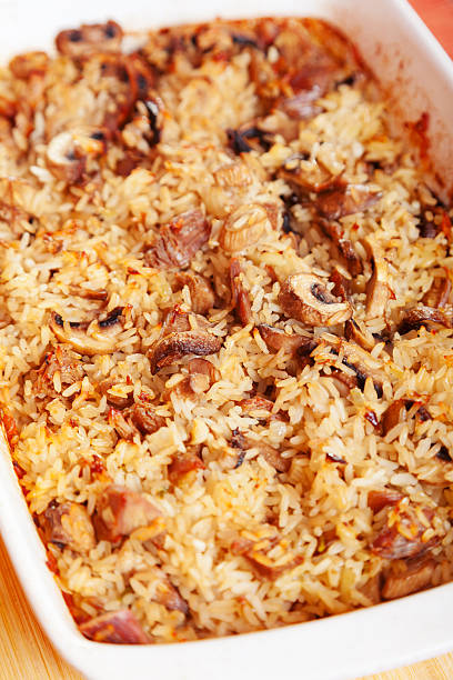 vegeterian запеканка - casserole rice single object close up стоковые фото и изображения