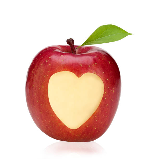 istock fresh red apple with heart symbol and leaf 185238476