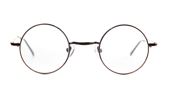 Stylish glasses for vision in a black round frame on a white background