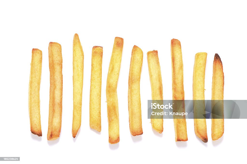 Pommes frites in einer Reihe auf weißem Hintergrund - Lizenzfrei Pommes frites Stock-Foto