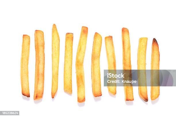 Pommes Frites In Einer Reihe Auf Weißem Hintergrund Stockfoto und mehr Bilder von Pommes frites