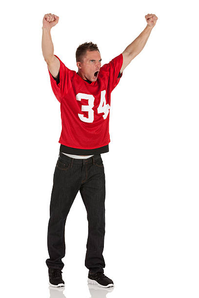 istock Sportsman shouting with arms raised 185238703