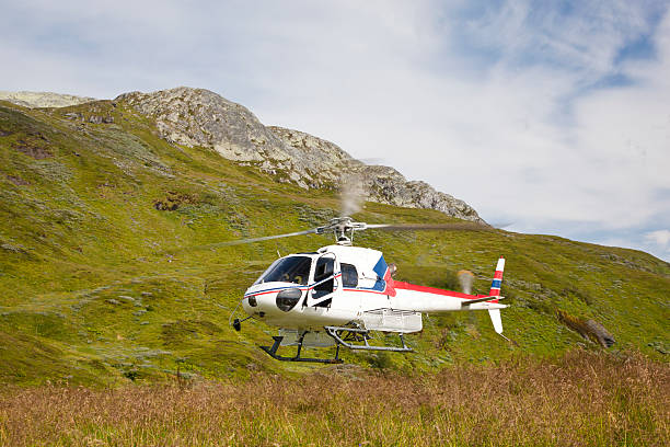 istock Helikopter landing in Norwegian mountains. Hardanger. 185238714