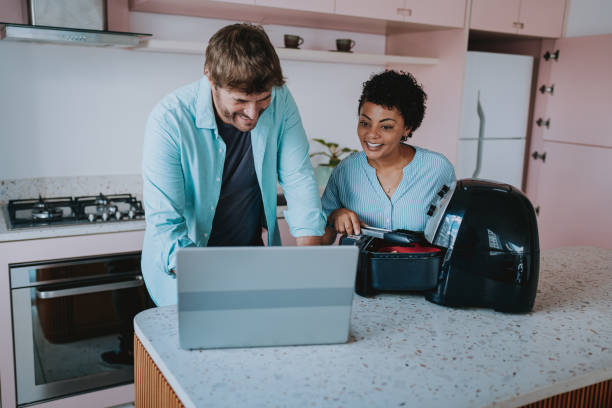 istock Couple in the kitchen 1852389858