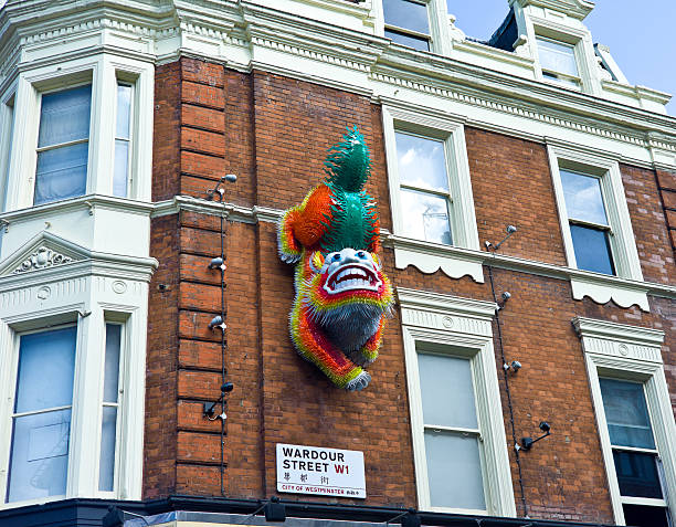 london architecture: china town dragon on building facade RELEVANT LIGHTBOXES LONDON + NYC
