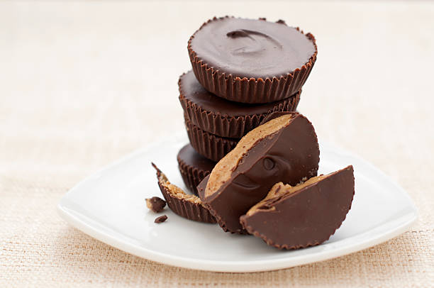 Peanut Butter Cups - Yum "Delicious homemade peanut butter cups, all natural peanut butter." peanut butter stock pictures, royalty-free photos & images