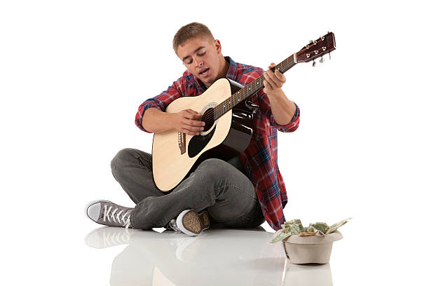 músico de rua com um violão - isolated on white studio shot guitar young men - fotografias e filmes do acervo