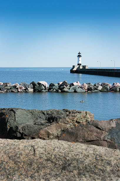 istock Lake Superior Lighthouse Viewed from Rocky Shore, Duluth, Minnesota Vt 185240392