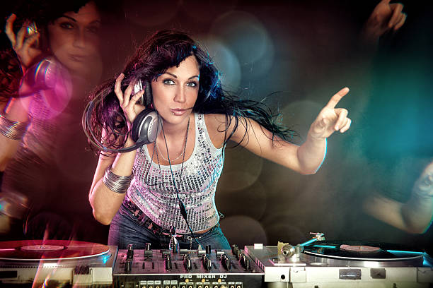 istock Female DJ playing music and dancing 185240628