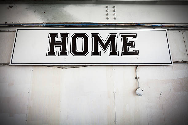 istock Home locker team sign in a sports stadium 185241069