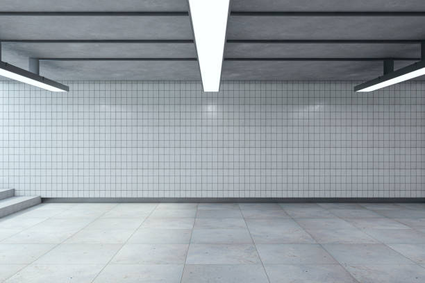 Light underground passage with ceiling lamps and stairs. Mock up place. Subway tile wall. 3D Rendering