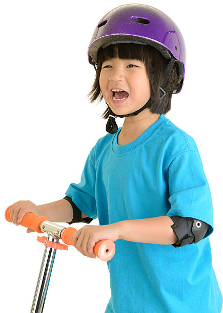 istock Smiling Girl with Helmet on Scooter 185241144