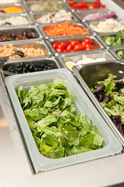 istock Fresh Iceberg Lettuce in Salad Bar Container 185241182