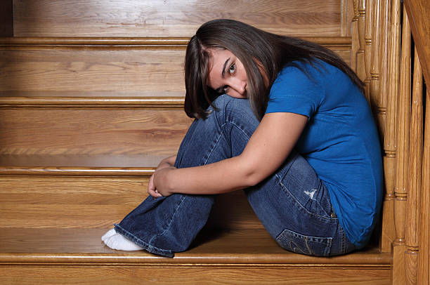 istock Girl Sitting on the Stairs 185241649