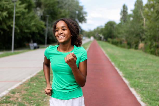 istock African girl running on a track 1852419094