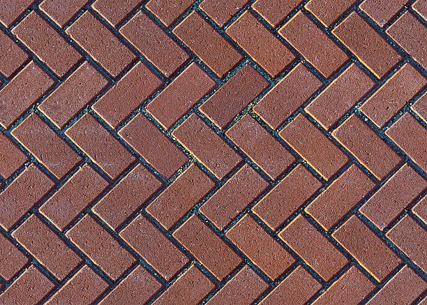 wzór w jodełkę brick kostki brukowe - sidewalk brick patio floor zdjęcia i obrazy z banku zdjęć