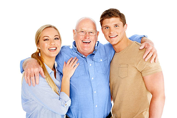 istock Happy senior man standing with his young children 185242971