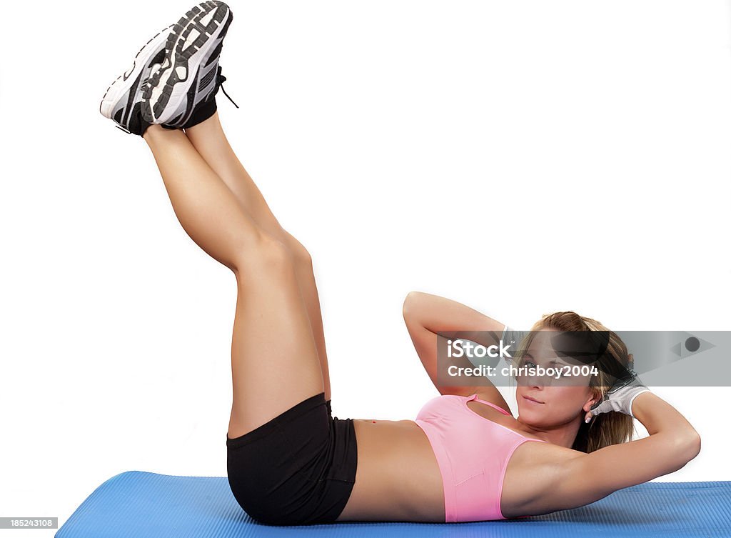 Ab Crunches young woman working out 20-24 Years Stock Photo