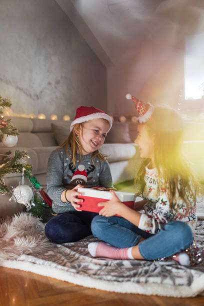 istock Happy children on Christmas Eve 1852432401